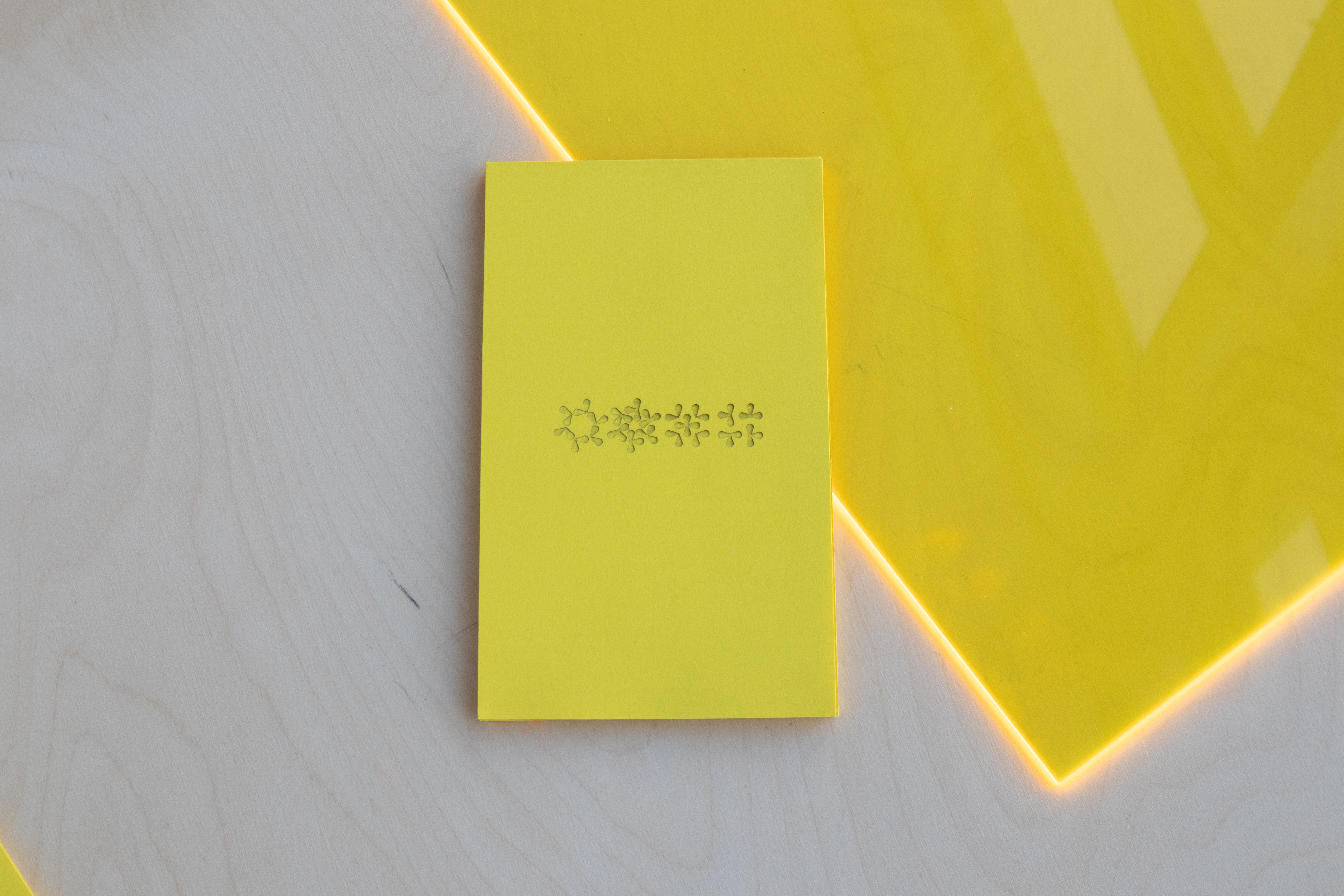 Yellow fanzine with graphic symbols